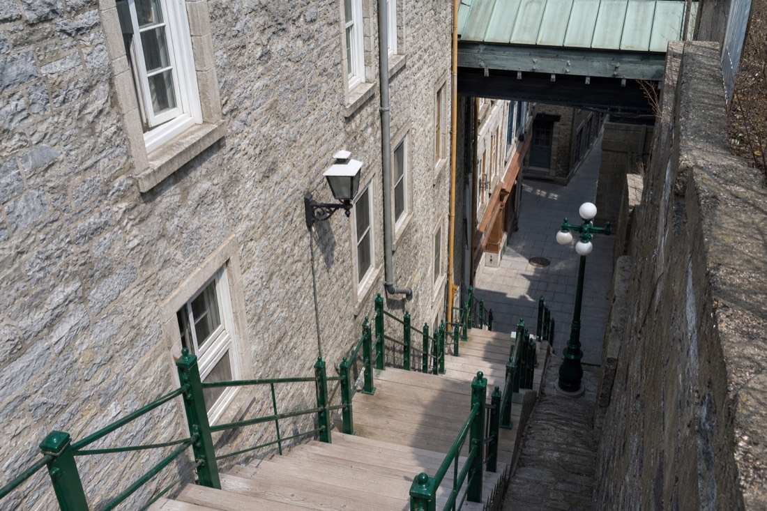 Steep Casse-Cou stairs connecting Upper and Lower Town in Old Quebec with cobblestones below