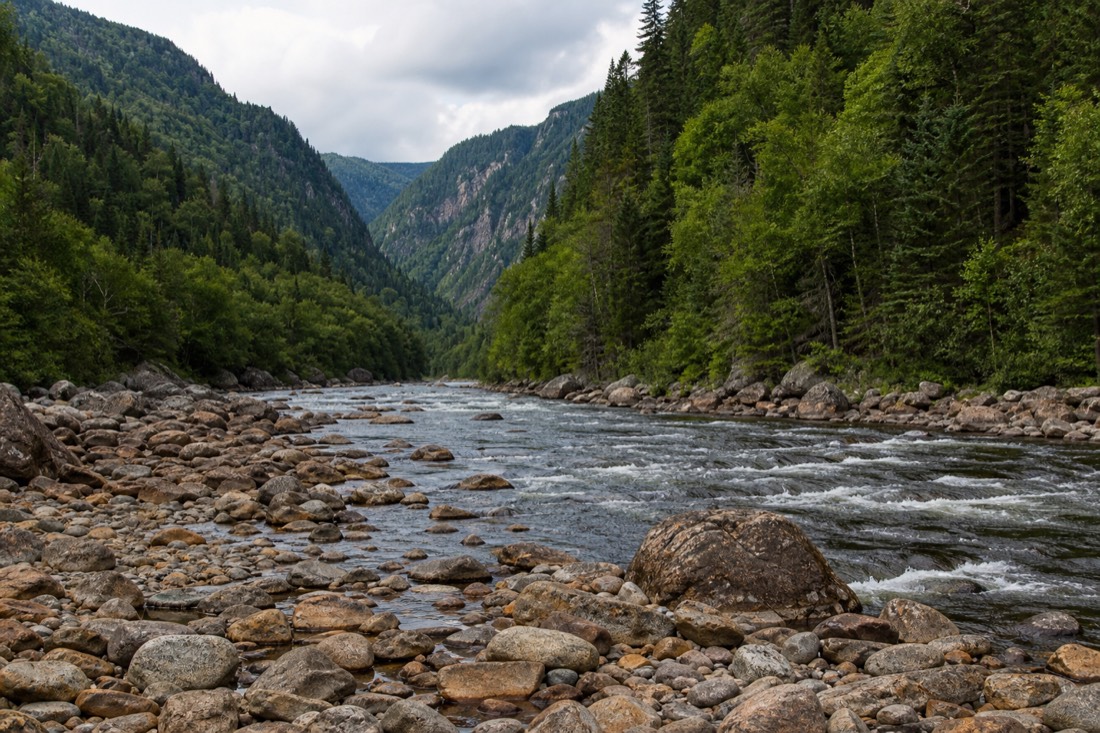 Glacial river valley with forested walls in Jacques-Cartier National Park north of Quebec City